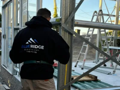 Blue Ridge electrician working on a commercial fit-out near Banora Point